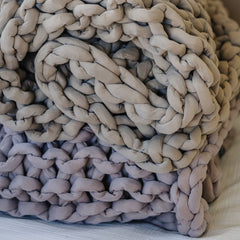 Blanket draped on bed #Color_Dusty-Rose