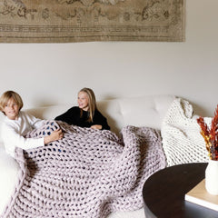 Kids on couch with knit blankets #Color_Dusty-Rose